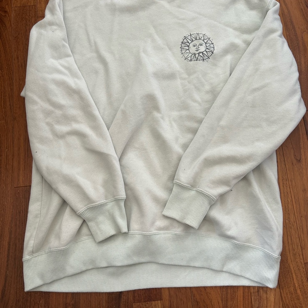 White Sweatshirt with Sun Design